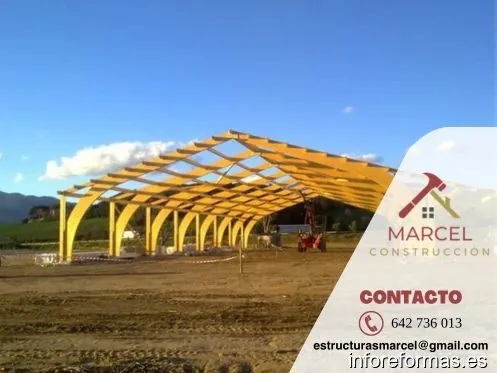 MARCEL ESTRUCTURAS EN MADERA LAMINADA SL. - Naves de Madera - Casas en Madera - Tejados en Madera - Comederos para Ovejas
